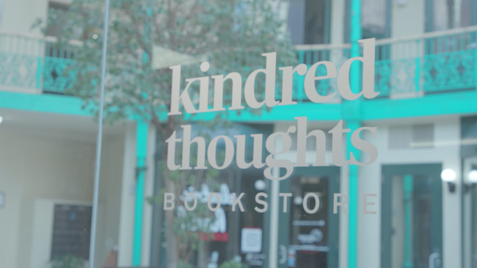 Kindred Thoughts Bookstore lettering on the storefront window